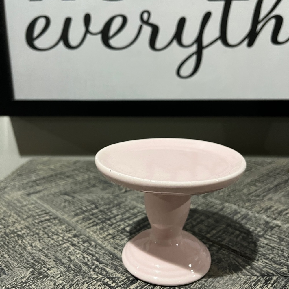 Ceramic pillar candle holder.